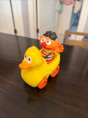 Sesame Street Yellow Duck Pull Toy with Orange-Red Character